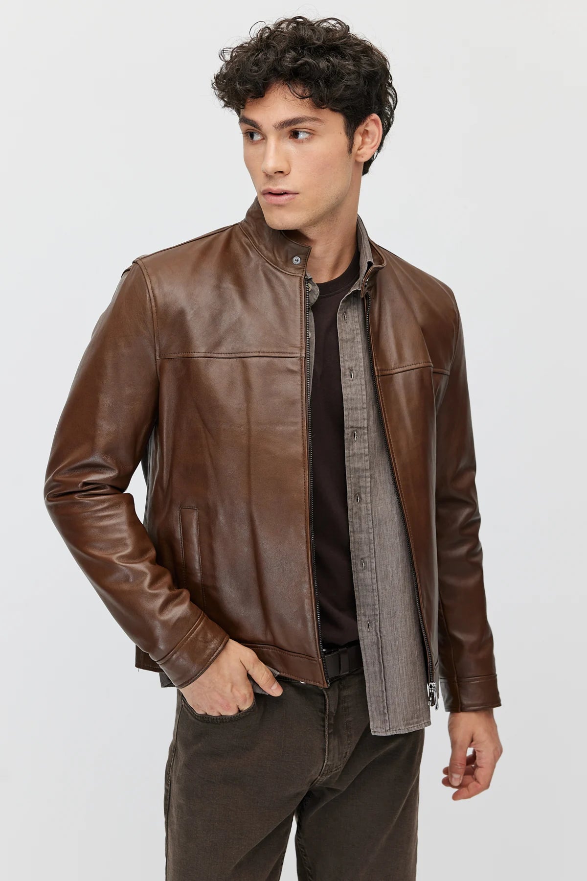 Men's leather jacket with zipper and double pockets.